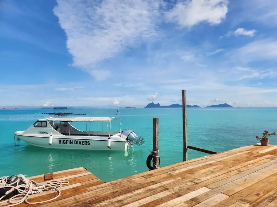 View of the ocean from the private overwater deck Bigfin Water Bungalow
